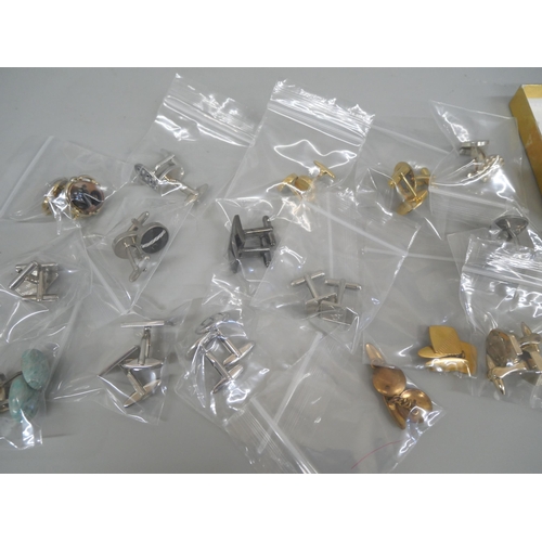619 - Seventeen pairs of cufflinks, tie pins and slides