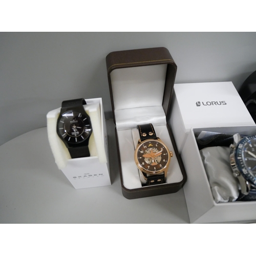 622 - Six boxed wristwatches; two Pulsar, Spitfire, Lorus, Fossil and Skagen
