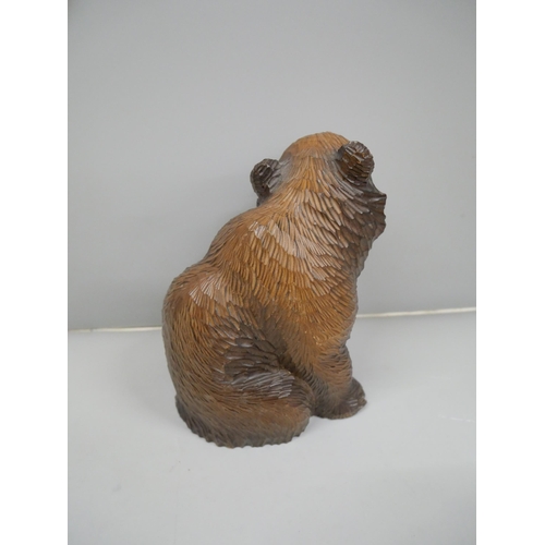 636 - A Black Forest carved bear, 18cm