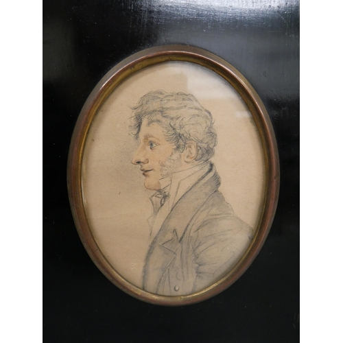 639 - A Regency oval pencil and wash drawing - subject is a William Harris, ebony and brass frame