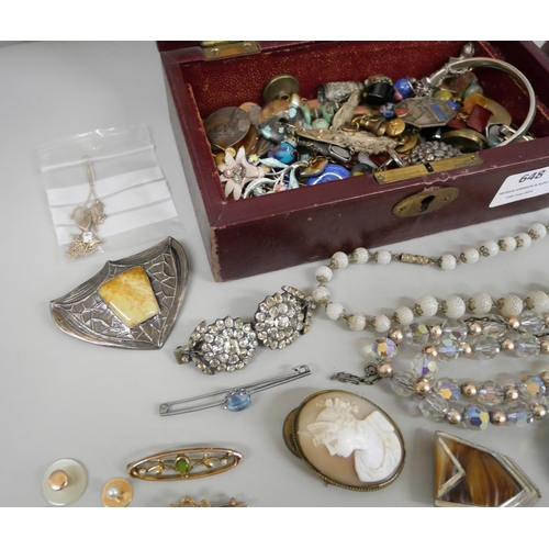648 - Vintage costume jewellery in a red jewellery box including 5.6g of scrap gold, etc.