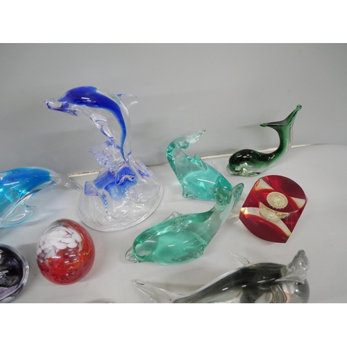 651 - A collection of eleven glass dolphins and paperweights **PLEASE NOTE THIS LOT IS NOT ELIGIBLE FOR IN... 