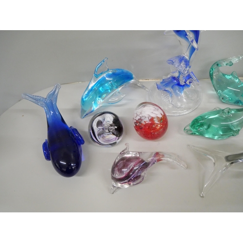 651 - A collection of eleven glass dolphins and paperweights **PLEASE NOTE THIS LOT IS NOT ELIGIBLE FOR IN... 