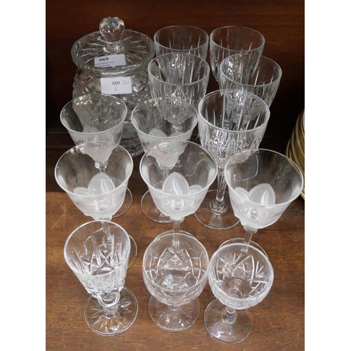669 - A collection of Waterford crystal including drinking glasses, a biscuit barrel and a set of five sig... 