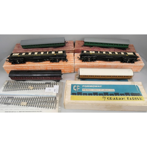673 - Four Graham Farish OO-gauge model rail carriages, a/f, boxed, and other accessories