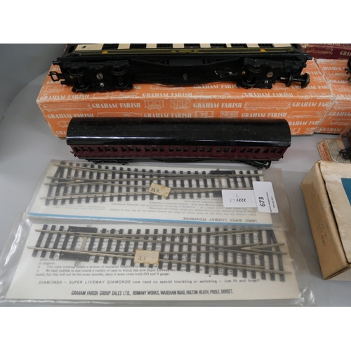 673 - Four Graham Farish OO-gauge model rail carriages, a/f, boxed, and other accessories