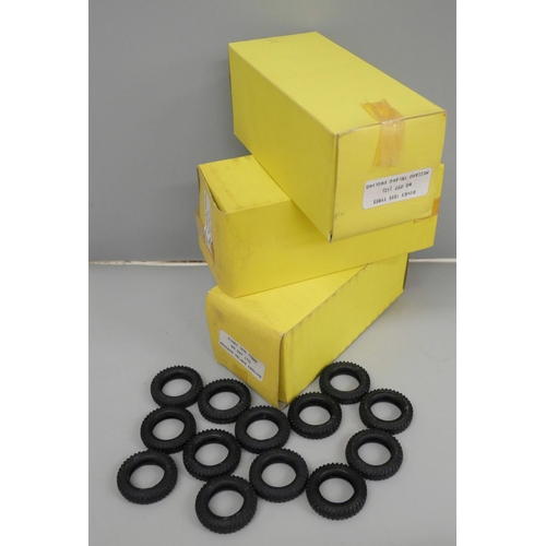689 - Three boxes of twelve Dinky toy tyres, no.097