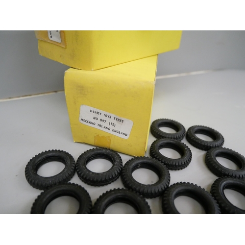 689 - Three boxes of twelve Dinky toy tyres, no.097