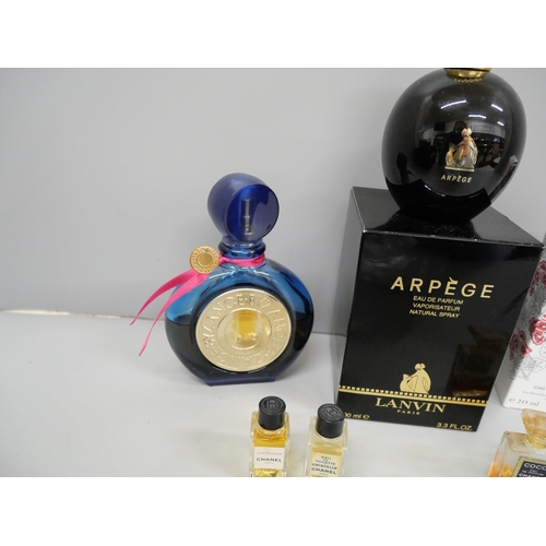 693 - A collection of assorted perfumes including Arpege by Lanpin, Paris