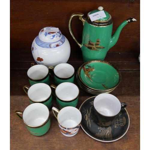 700 - A Noritake green, black and gold coffee set, five setting and other oriental china, coffee pot a/f