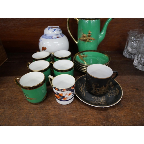 700 - A Noritake green, black and gold coffee set, five setting and other oriental china, coffee pot a/f