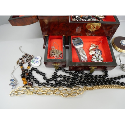 708 - A jewellery box containing costume jewellery
