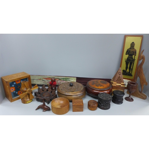 740 - A collection of treen including a 1970s clock, pots, models, fan, etc.