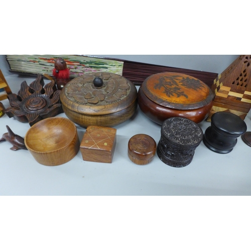 740 - A collection of treen including a 1970s clock, pots, models, fan, etc.