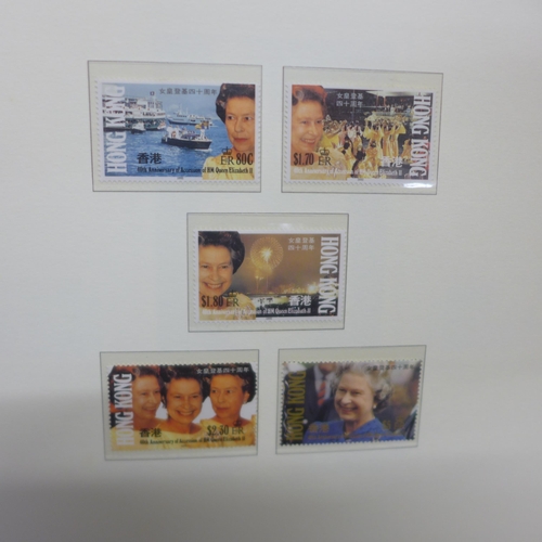 764 - Five albums with Royal Commemorative coin covers and stamp covers and a collection of Royalty poster... 