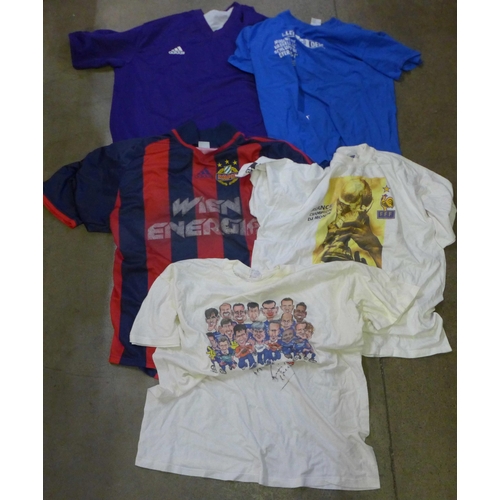 779 - Football shirts and t-shirts selection including Leicester City, Rapid Vienna, Real Madrid, etc.