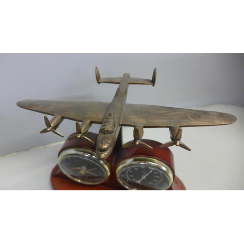 783 - A model Boeing PT-17 Stearman bi-plane, a 70th anniversary Lancaster bomber display, two Corgi aircr... 