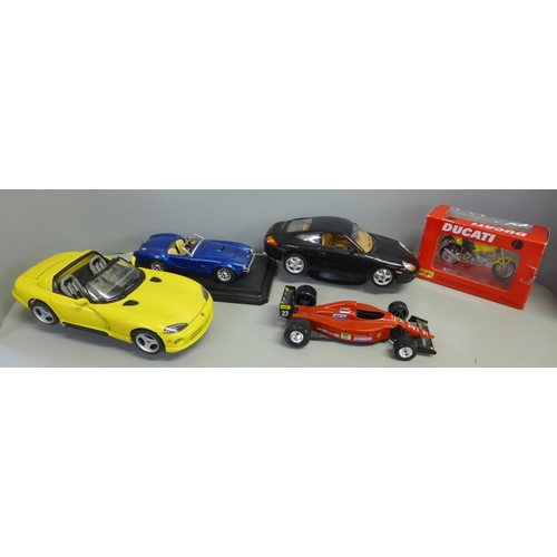 789 - A collection of 1/18 scale model vehicles, Maisto and Burago, including Jaguar E type, other model v... 