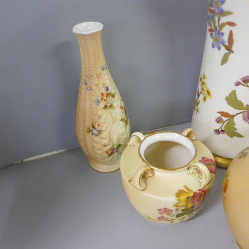 802 - A collection of Royal Worcester blush ivory including a large ewer, flatbacked jug, vases and pots, ... 