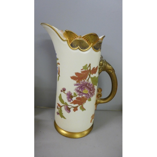 802 - A collection of Royal Worcester blush ivory including a large ewer, flatbacked jug, vases and pots, ... 