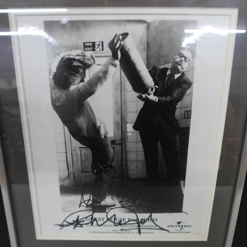 806 - A 'Bottom' film still signed by Ade Edmondson and Rik Mayall with Certificate of Authentication