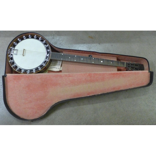 824 - A New Windsor zither banjo, cased