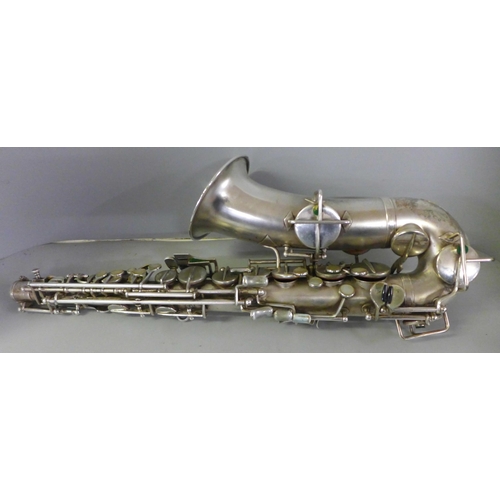 828 - A saxophone, cased