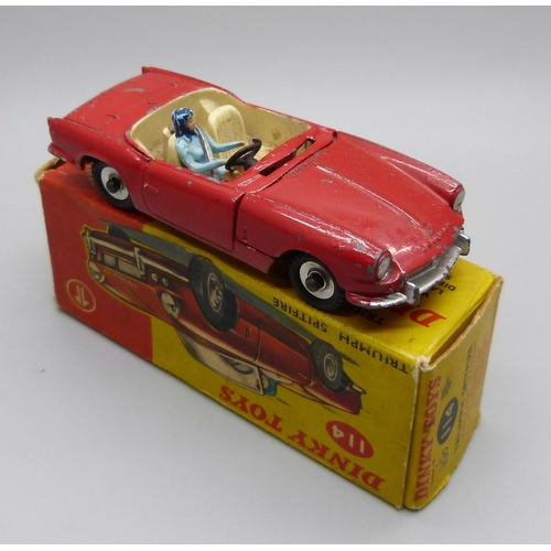 833 - A Dinky Toys 114 Triumph Spitfire model vehicle, boxed