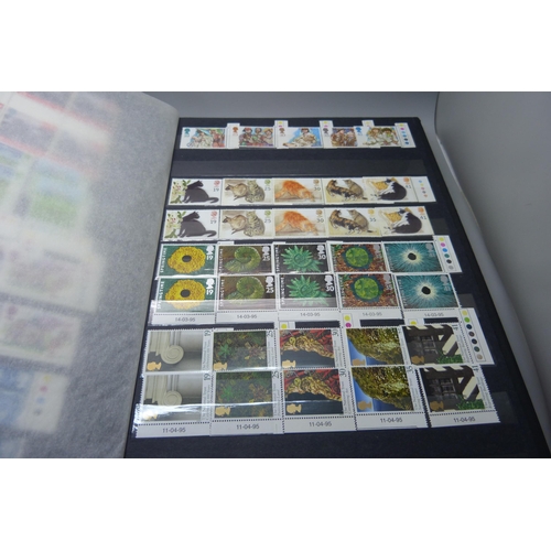 837 - Great Britain 1991-2000 unmounted mint commemoratives in stock book, face value in excess of £240