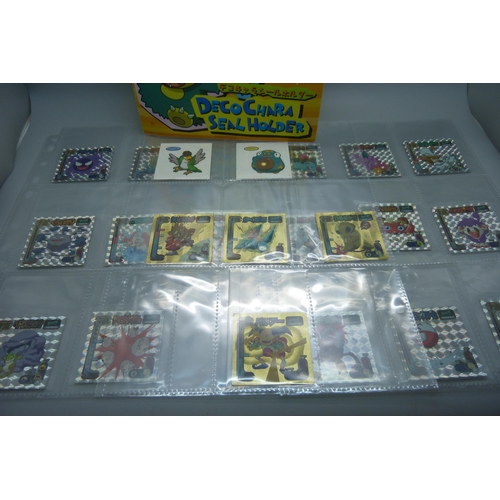 845 - An album of Pokemon Deco Chara Seal holder stickers and approximately twenty five Japanese Amada sti... 