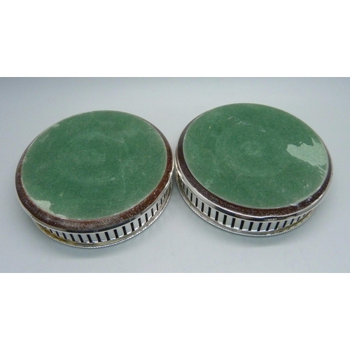 863 - A pair of silver wine coasters, diameter 9cm