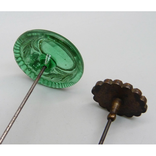 864 - A guilloche enamel hat pin and an Art Nouveau glass hat pin