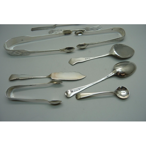 882 - A collection of silver spoons, pickle forks, sugar bows, 180g