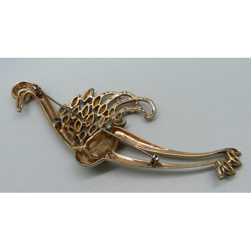 884 - A Coro Craft sterling silver bird brooch, lacing two stones, 11cm