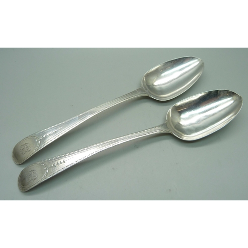 890 - A pair of George III silver spoons, London 1785 by Hester Bateman, 107g