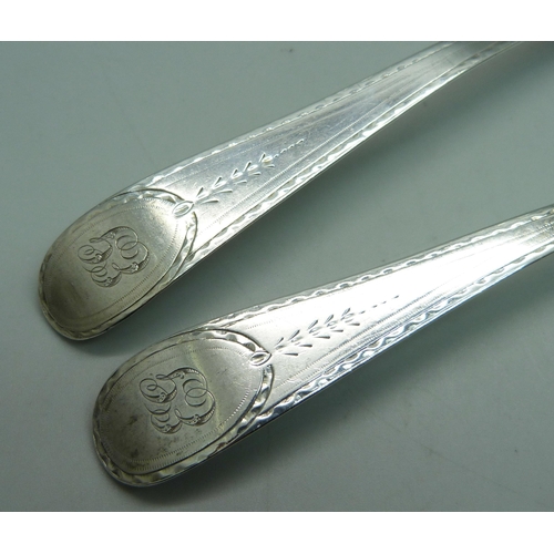 890 - A pair of George III silver spoons, London 1785 by Hester Bateman, 107g