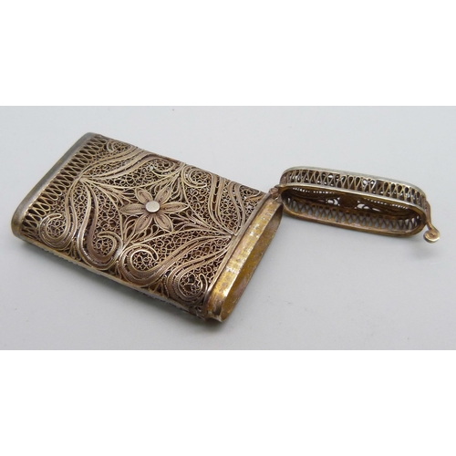 896 - A vintage filigree vesta case, tests as silver