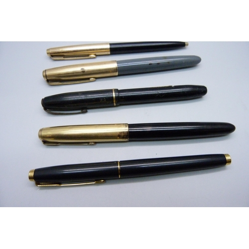 909 - Four Parker pens, one with 14ct gold nib and one ballpoint, and a Conway Stewart fountain pen with 1... 