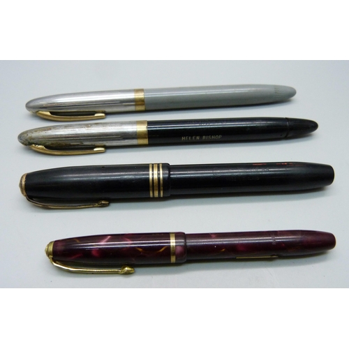 910 - Four pens; Conway Stewart Dinkie 550 with marbled cap and barrel and 14ct gold nib, a Conway Stewart... 