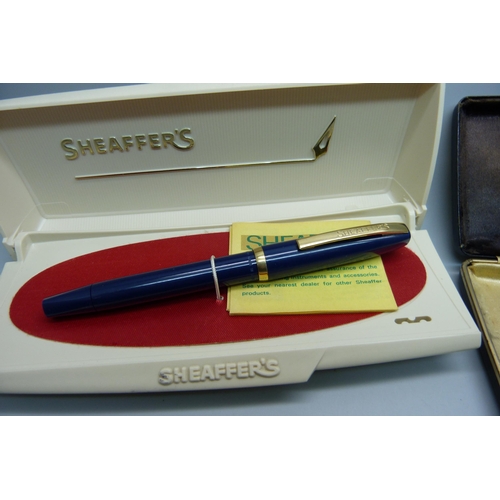 911 - A Sheaffer pen, boxed, with PdAg nib and two other Sheaffer pens