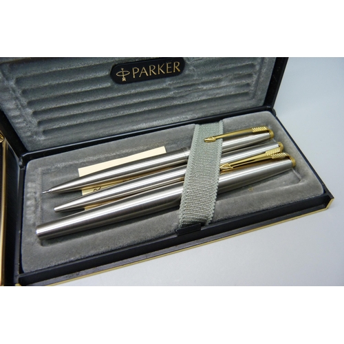 917 - A Parker 45 pen set and a vintage Waterman's pen with 14k gold nib, both boxed