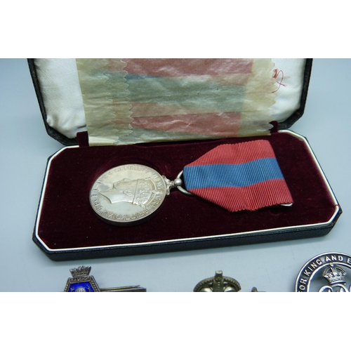 928 - A George VI Imperial Service Medal to Mabel Priscilla Purdy, a silver wound badge numbered 310763, s... 