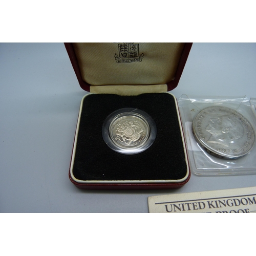 934 - Two 1935 George V crowns and a silver proof pound coin