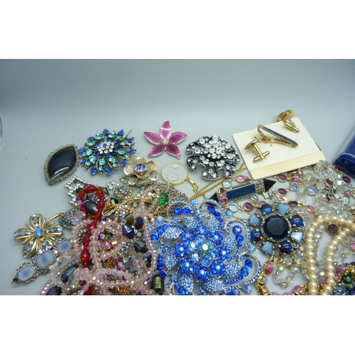 955 - Costume jewellery, paste set brooches, bead necklaces, etc.