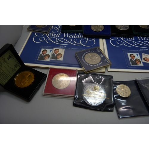 957 - A collection of coins, coin covers and a stamp cover, including two £5 coins, coin sets, etc.