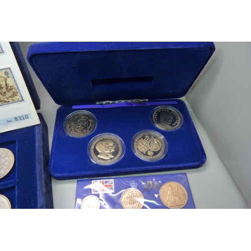 957 - A collection of coins, coin covers and a stamp cover, including two £5 coins, coin sets, etc.