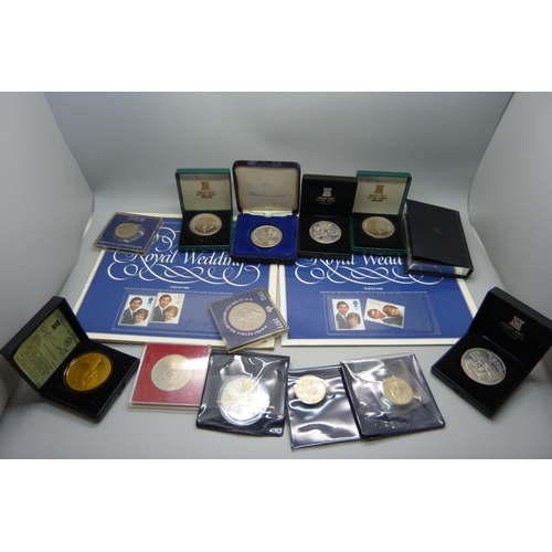 957 - A collection of coins, coin covers and a stamp cover, including two £5 coins, coin sets, etc.