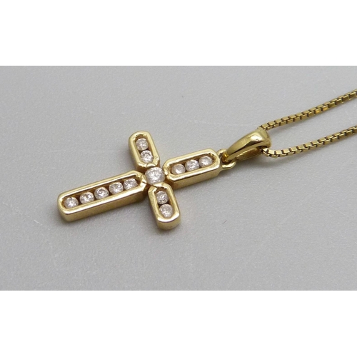 966 - An 18ct gold channel set diamond pendant on an 18ct gold chain, 3.1g, chain 39cm