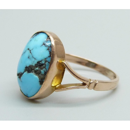 973 - A 9ct gold and cabochon cut turquoise ring, 2.4g, N