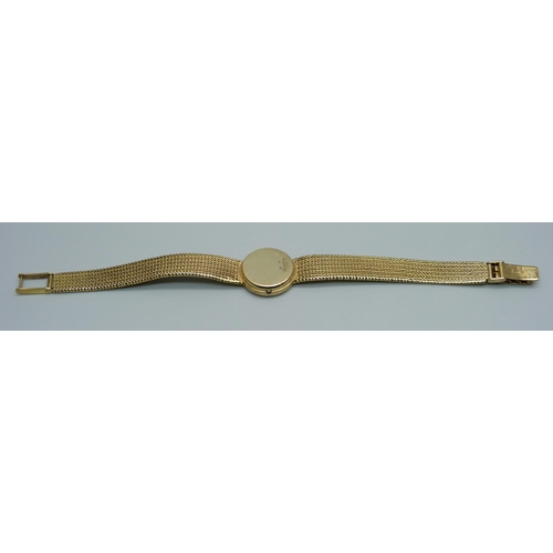 981 - A 9ct gold lady's Omega quartz wristwatch with a 9ct gold integrated strap, 22.9g